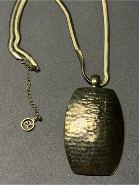Eye Catcher- Erica Lyons Gold Hammered Pendant Statement Necklace